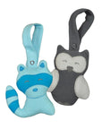 Two small stuffed animals that are a blue raccoon and gray owl.